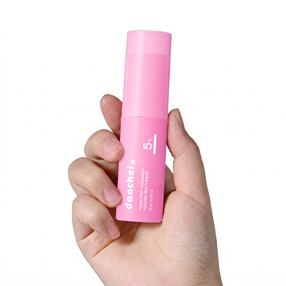 Hand holding the compact twist-up collagen balm stick